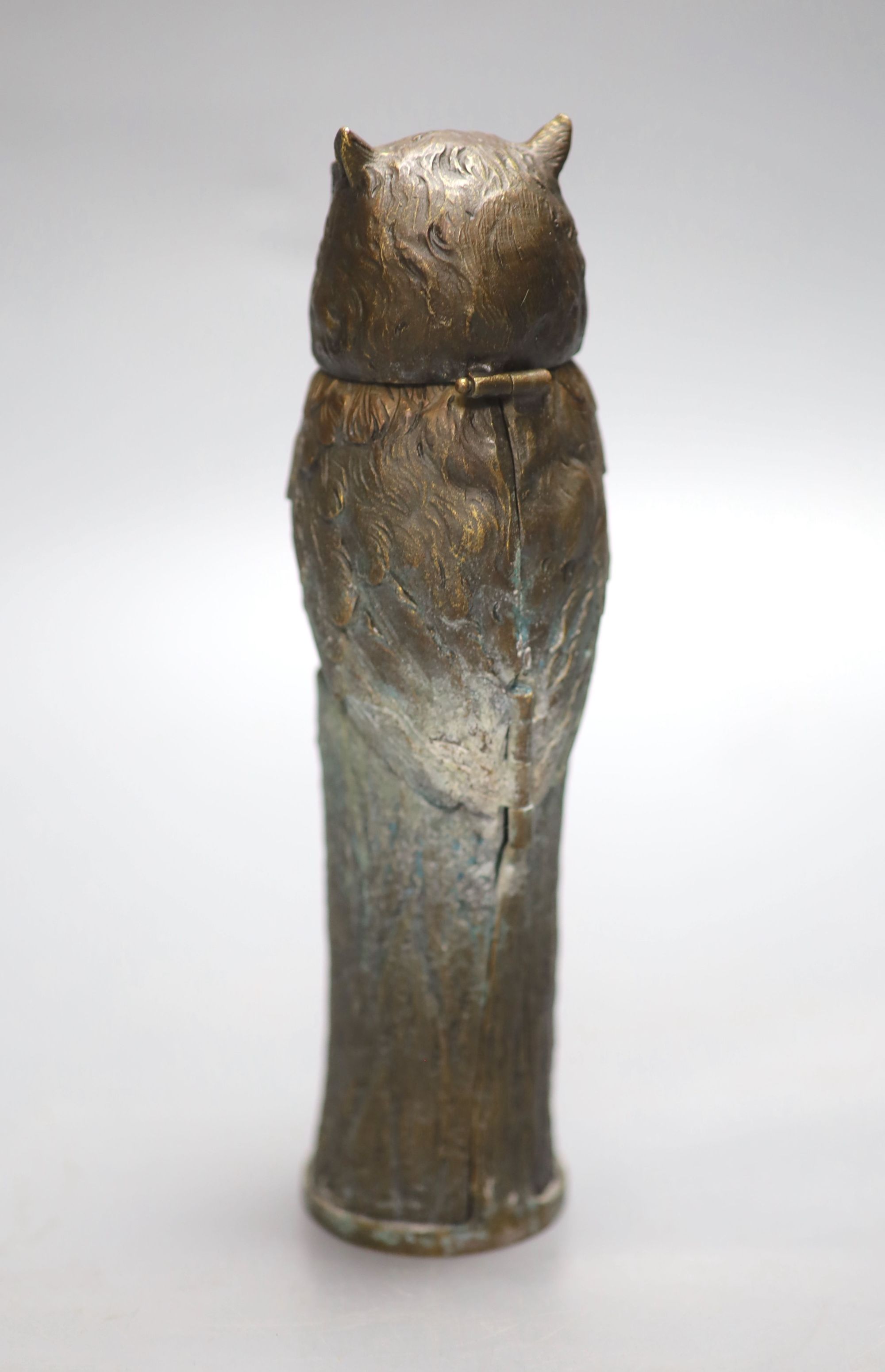 After Bergman. A bronze of an owl embracing a nude lady, height 19cm